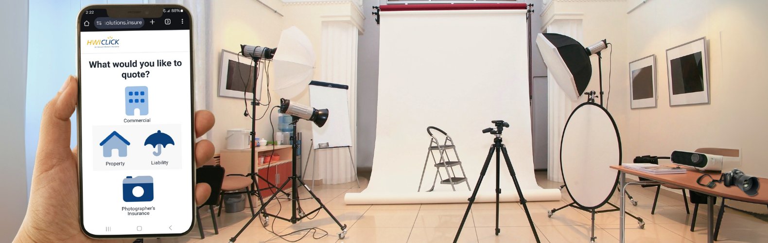 Photography studio with several lights and cameras and smartphone with hwiclick on the screen